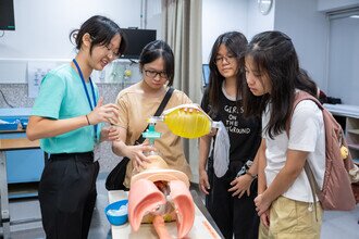 Demonstration by student of the Nethersole School of Nursing