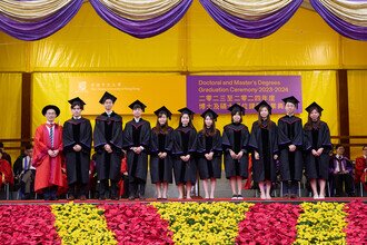 Graduates being blessed and congratulated by Faculty member