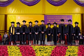 Graduates being blessed and congratulated by Faculty member