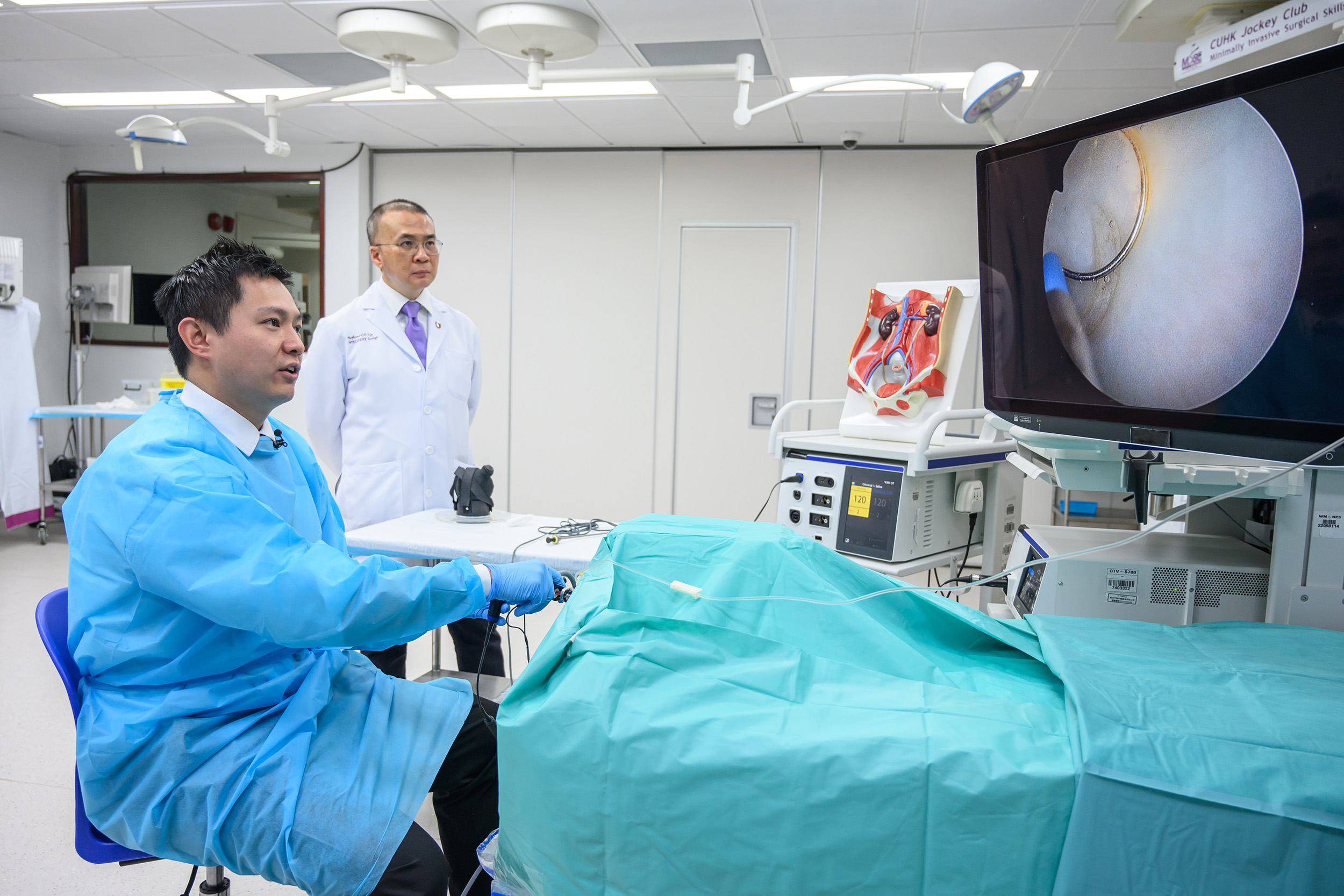 Dr Jeremy Teoh performs a mock demonstration of ERBT.